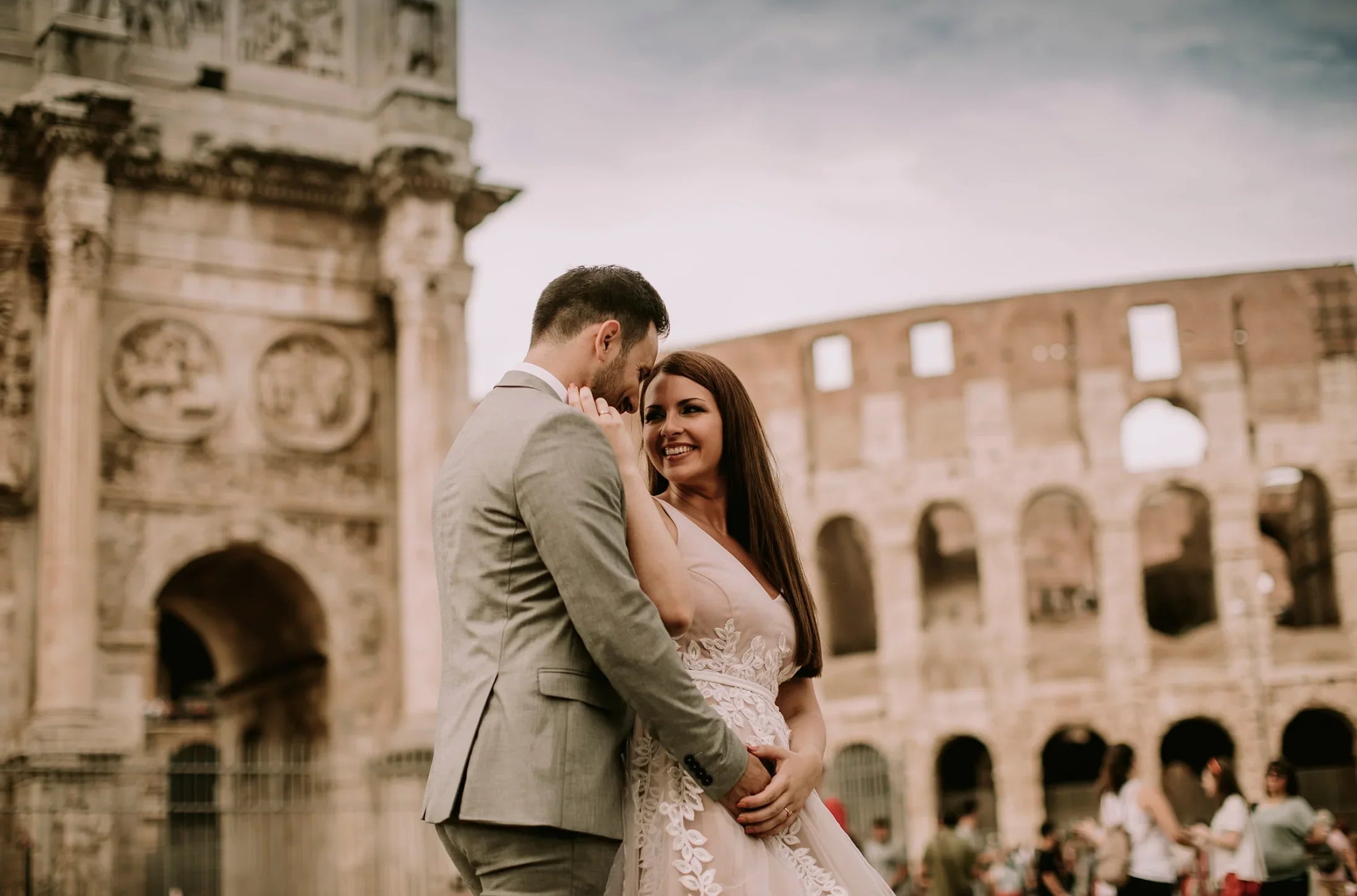 Couple in Rome infront of Colosseum